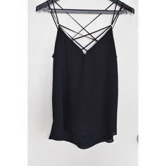 Small. Black Strappy Top, Material Is Very Nice. Never Worn Casual Black Strappy Tank Top, Casual Strappy Top For Night Out, Edgy Black Cami Tops, Elegant Strappy Tops For Night Out, Black Strappy Top For Spring, Black Strappy Tank Top For Night Out, Trendy Black Tank Top For Date Night, Black Strappy Tank Top, Black Tank Top For Spring Night Out