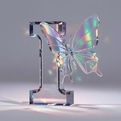 a glass sculpture with a butterfly on it