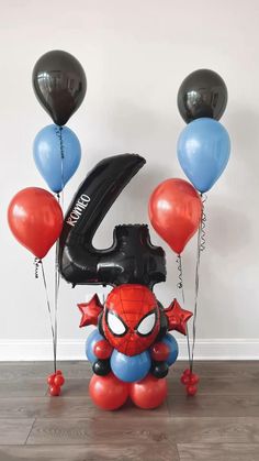 the balloon sculpture is made to look like spiderman