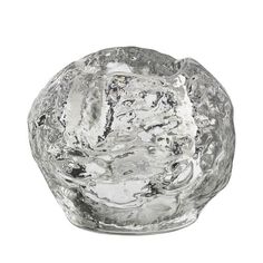 a glass bowl sitting on top of a white table