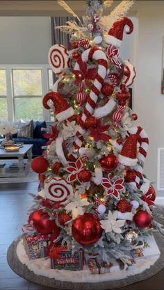 a christmas tree decorated with candy canes and ornaments