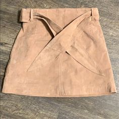 Size 28 Leather Skirt. Zip Up The Back. Comes With A Belt. Can Be Worn Without. New With Tags. Great Fall Staple! Color Is A Dusty Pink. Brown Skirt With Belt Loops For Spring, Spring Brown Skirt With Belt Loops, Pink Leather Skirt, Black Jean Skirt, Wrap Mini Skirt, Jean Mini Skirts, Suede Mini Skirt, Black Leather Skirts, Purple Suede