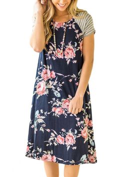 Navy Blue Floral Print A-line Loose T-shirt Dress Spring Casual Midi Length T-shirt Dress, Casual Midi Length T-shirt Dress For Spring, Casual Cotton Floral Knee-length Dress, Casual Flowy Floral Dress, Casual Cotton Knee-length Floral Dress, Casual Knee-length Cotton Floral Dress, Flowy Casual Cotton Floral Dress, Casual Blue Floral Dress With Short Sleeves, Blue Casual T-shirt Dress For Spring