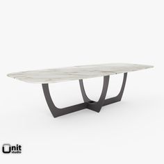 a white marble table with black metal legs and an oval shaped design on the top