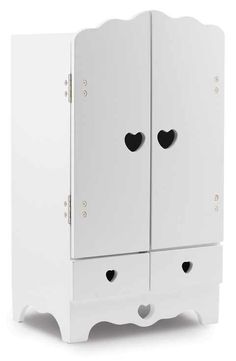 a white armoire with two hearts on the front and one in the back, against a white background