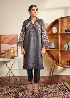 2 Piece Embroidered Suit for Women (Shirt & Trouser) Description : Organza strip kurta with grey base and a pop of colorful floral embroidery. Fabric : Shirt fabric is Organza stripe. Trouser fabric is Raw Silk. Festive Gray Embroidered Kurta, Festive Embroidered Gray Kurta, Gray Embroidered Kurta For Eid, Embroidered Gray Kurta For Eid, Embroidered Suit, Shirt Trouser, Suit Shirts, Embroidery Fabric, Grey Women