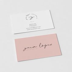 two business cards on top of each other with the word joy written in cursive writing