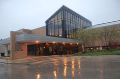 an empty parking lot in front of a building