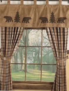 a window curtain with bear silhouettes on it and plaid curtains in front of the window