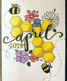 an open notebook with bees and flowers on it