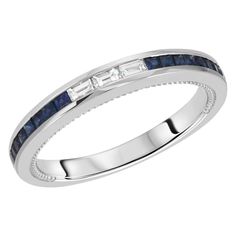 100% Authentic, 100% Customer Satisfaction Top: 2.7 mm Band Width: 2 mm Metal: 18K White Gold Size: 6-8 ( Please message Us for your Size ) Hallmarks: 18K Total Weight: 3.5 Grams Stone Type: 0.49 CT Blue Sapphire & 0.15 G SI-VS2 CT Diamonds Condition: New Estimated Retail Price: $1800 Stock Number: R3832 Classic Sapphire Stackable Diamond Ring, Classic Blue Eternity Band For Anniversary, Formal Blue Diamond Stackable Rings, Classic Blue Half Eternity Ring, Classic Blue Diamond Half Eternity Ring, Classic Blue Half Eternity Diamond Ring, Classic Sapphire Eternity Band For Anniversary, Classic Blue Stackable Rings With Round Cut, Blue Classic Stackable Rings Round Cut