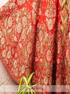 Red And Rose Pink Raw Silk Bridal Lehenga With Embroidery And Net Dupatta (Set of 3) Fabric details: Lehenga - Raw Silk Blouse - Raw Silk Dupatta - Net Embroidery: Lehenga - Zardosi, Resham And Sequence Work Blouse - Zardosi, Resham And Sequence Work Dupatta - Zardosi, Resham And Sequence Work Wash Care Instructions: Dry clean only Note: This product is made to order. No returns The product will be shipped within 4-6 weeks of the order placed Wedding Choli With Floral Embroidery In Silk Thread, Silk Thread Wedding Choli With Floral Embroidery, Red Sharara With Floral Embroidery For Wedding, Festive Lehenga With Floral Embroidery For Traditional Ceremonies, Red Silk Thread Lehenga For Navratri, Red Silk Lehenga For Navratri, Floral Embroidered Lehenga For Diwali, Festive Choli With Floral Embroidery For Traditional Ceremonies, Festive Floral Embroidered Sharara For Traditional Ceremonies