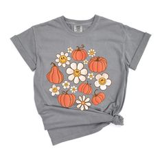 Looking for a cute versatile top to wear this summer? Make sure to grab one of our Circle Pumpkin Flowers garment dyed graphic tees! This soft and comfortable graphic tee is the perfect top for any outfit. It can be paired with biker shorts, jeans, or even a simple skirt/dress! This tee is true-to-size, so be sure to order your regular t-shirt size! If you are looking for a more oversized look, make sure to size up! Fall Relaxed Fit Washed T-shirt, Trendy Acid Wash T-shirt For Fall, Washed T-shirt With Relaxed Fit For Fall, Relaxed Fit Washed T-shirt For Fall, Acid Wash T-shirt With Letter Print For Fall, Fall Acid Wash Soft-washed T-shirt, Acid Wash Soft-washed T-shirt For Fall, Cute Tie Dye Graphic Print T-shirt, Cute Tie-dye Graphic Print T-shirt