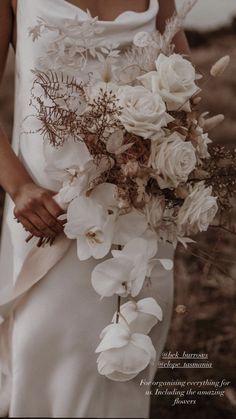 a woman in a white dress holding a bouquet of flowers and an inscription on the back