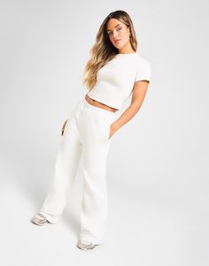 Hit refresh on your off-duty faves with these women's Wide Leg Joggers from DAILYSZN, exclusive to JD. In a White colourway, these baggy-fitting joggers are made with soft cotton for cosy comfort. They feature an elasticated waistband with a drawstring to adjust the fit, and roomy wide legs for a laidback feel. With side pockets for easy storage, they're finished with signature DAILYSZN branding to the thigh and back waist. Machine washable. | Our model is 5'7" and wears a size medium. Wide Leg Joggers, Jd Sports, Wide Legs, Adidas Nike, Easy Storage, Chucks Converse, No Equipment Workout, Short Tops, Track Pants