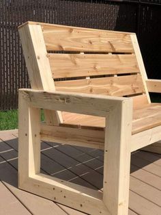 a wooden bench sitting on top of a patio