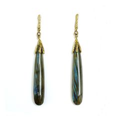 Handcrafted in rich 18 karat yellow gold, with blue-grey Labradorite drops, these earrings are finished with 20 brilliant cut diamonds weighing 0.10 carats total weight. Total earring length is 2.5 inches. Post backs. I would love to make you these earrings! As I am a one- person business, please allow 4-6 weeks for me to make it for you. If I can, I will ship it faster! If you need it by a special date, please email me at johannatorelldesign@gmail.com. Thank you, Johanna Elegant Labradorite Drop Earrings, Elegant Labradorite Dangle Earrings, Elegant Labradorite Teardrop Earrings, Elegant Teardrop Labradorite Earrings, Elegant Drop Labradorite Jewelry, Elegant Labradorite Drop Jewelry, Brilliant Cut Diamond, Labradorite, Blue Grey