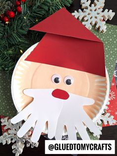 a paper plate with a santa clause on it