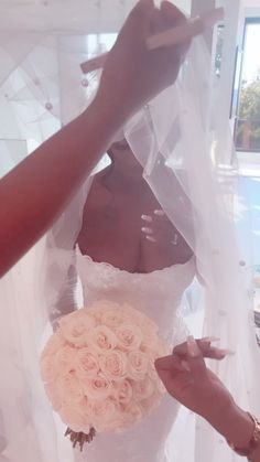 the bride is getting ready to walk down the aisle with her bouquet on her wedding day