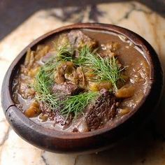 a close up of a bowl of food on a table