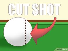 a close up of a white ball with a red arrow pointing to the word cut shot