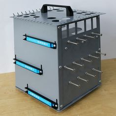 a large metal box with four drawers on it