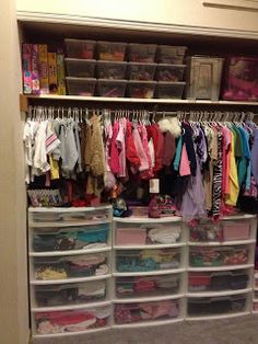 the closet is filled with lots of children's clothes