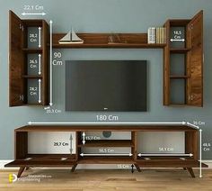 an entertainment center is shown with measurements for the wall unit and shelves to fit in