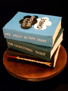 three books stacked on top of each other with the words, fiction in our stars and the lightning thief