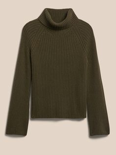 Crafted from our most luxurious cashmere yarn, this soft sweater is based on an original piece from the Banana Republic archives> Take note how our designers artfully arranged its ribbed-knit stitches to flow freely from the sleek mock-neck down to t Cozy Cashmere High-neck Sweater, Winter Cashmere V-neck Sweater With Ribbed Cuffs, Stretch High-neck Sweater With Ribbed Cuffs, Elegant Merino Wool V-neck Sweater With Ribbed Cuffs, Banana Republic Forever Sweater, Flare Sleeve Sweater, Cashmere Yarn, Softest Sweater, Sweater Sleeves