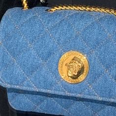 Like New Used Once Versace Denim Quilted Bag Trendy Denim Bags With Dust Bag Included, Luxury Denim Blue Denim Bag, Designer Denim Shoulder Bag With Branded Hardware, Designer Denim Blue Bags, Luxury Denim Blue Shoulder Bag, Denim Blue Bags With Branded Hardware, Luxury Denim Shoulder Bag, Designer Denim Blue Rectangular Shoulder Bag, Designer Blue Denim Bags