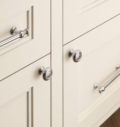 a close up view of some drawers with handles and knobs