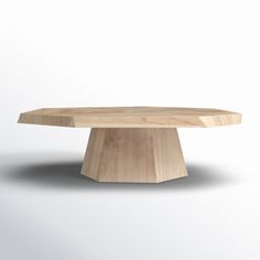 an oval wooden table on a white background