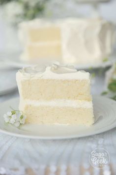 a slice of white cake sitting on top of a plate