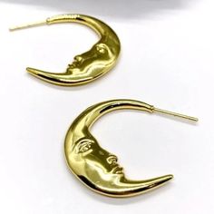 New Crescent Moon Face Statement Earrings Features: Gold Plated Stainless Steel, Beautiful Detail, Double Sided Crescent Moon Earrings Nwot Gold Moon Shaped Metal Hoop Earrings, Gold Moon-shaped Metal Hoop Earrings, Gold Moon Shaped Hoop Earrings, Trendy Gold Crescent Earrings, Trendy Crescent Earrings For Pierced Ears, Gold Moon-shaped Earrings, Trendy Moon Charm Earrings As A Gift, Trendy Earrings With Moon Charm As Gift, Metal Moon-shaped Hoop Earrings