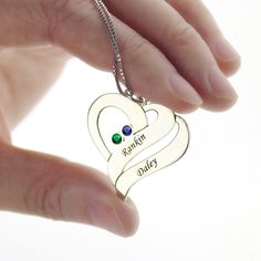 Our Two Hearts Forever One Necklace features beautiful birthstones and personalized engravings of each person. Meticulously handcrafted from .925 Sterling Silver and your choice of plating option: 18K Gold. An excellent gift choice for the one you love. Personalized Heart Pendant Birthstone Necklace As A Gift, Customizable Heart-shaped Birthstone Necklace Gift, Customizable Heart-shaped Birthstone Necklace For Gifts, Customizable Gold Heart Necklace In Sterling Silver, Gold Heart Necklace With May Birthstone As Gift, White Gold Heart Necklace With Birthstone As Gift, Personalized Gold Heart Pendant Birthstone Necklace, Personalized Heart Pendant Birthstone Necklace For Anniversary, Personalized Gold Birthstone Necklace With Heart Pendant