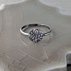 This charming ring will be made to order: cast in sterling silver precious metal clay from a mold I made of an antique button depicting the delicate details of a lovely morning glory flower.  Once fired the clay is transformed into solid sterling silver it is burnished for several hours, then oxidized and buffed to bring out detail, burnished again and then hand polished for a mellow shine. This ring will be made to order in whole sizes from 5 to 8. I crafted this ring by hand with a love and passion not only for my my medium but also for the subject matter. My pendant embodies the beauty and charm of nature's own creation. With a design inspired by vintage aesthetics, this ring evokes a sense of nostalgia and a delicate beauty.  The morning glory flower, symbolizing love, affection, and r September Birth Flower, Lovely Morning, Silver Flower Ring, Silver Springs, Victorian Flowers, Vintage Aesthetics, Precious Metal Clay, Delicate Beauty, List Ideas