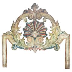 an ornate headboard made out of wood and marble