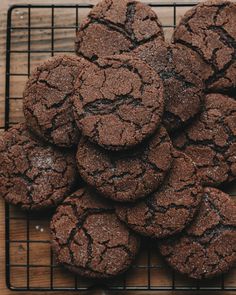 chocolate cookies sitting on top of a cooling rack