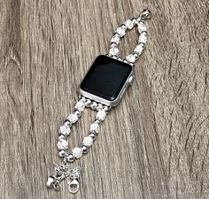 Know someone who owns Apple Watch Series? This is the PERFECT gift! Be Different & Unique! 925 Sterling Silver Beads with Strong Earth Magnet & Secure Safety Chain Designed And Handmade by Simeon D Jewelry Studio The Bracelet fits Apple Watch All Series Not For Other Models. Apple Watch Is NOT Included Follow my Studio for Updates & New Designs Metal Bracelet Strap Apple Watch Band, Silver Bracelet Strap Watch Bands, Metal Apple Watch Band With Bracelet Strap, Rectangular Metal Bracelet Strap Apple Watch Band, Metal Rectangular Apple Watch Band With Bracelet Strap, Adjustable Silver Bracelet Apple Watch Band, Adjustable Silver Bracelet Strap Apple Watch Band, Apple Watch Women, Silver Apple Watch