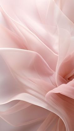 an abstract photo of pink and white fabric with soft folds on the bottom half of it