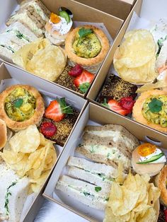 four boxes filled with different types of food