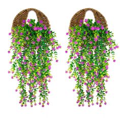 two wicker baskets with purple flowers hanging from the sides and green leaves on each side