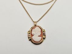 Vintage 10k Yellow Gold and Rose Gold Portrait of a Lady Carved Shell Cameo Necklace  Item w#889 Clean and in good condition  18 inches long chain with a push in style clasp 3.2grams Pendant and bail is approx 1 inch long Marked 10k Welcome to Westgate Jewels! At Westgate Jewels, we specialize in vintage estate jewelry, vintage designer jewelry, Vintage Native American jewelry and wears, Collectables, and Vintage fine karat gold and sterling silver jewelry. Our Collection Our shop features items John Hardy Rings, Gold Portrait, Lady Necklace, Vintage Native American Jewelry, Vintage Designer Jewelry, Carved Shell, Cameo Necklace, Bethlehem, A Lady