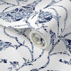 a blue and white floral wallpaper pattern