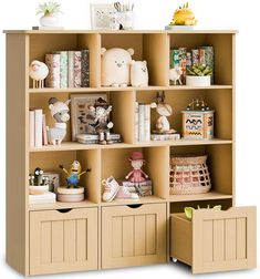 an open bookcase with drawers and stuffed animals on the top one shelf is filled with children's toys