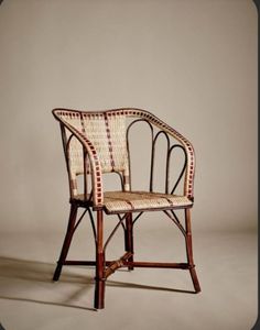 a wicker chair sitting on top of a white floor