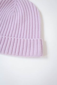 Fabric content: 100% Cashmere + lycra Construction details: 2x2 rib knit Country of origin: China Yarn & Mill Certifications/Licenses: The Good Cashmere Standard, Global Recycled Standard, Responsible Wool Standard, Organic 100 Content Standard, OEKO-TEX Standard 100 Size and Fit: One size Care Instructions: Dry Clean Fitted Soft Knit Beanie, Classic Fitted Knitted Beanie, Trendy Fitted Knit Beanie, Classic Fitted Soft Knit Hat, Ribbed Fitted Hats For Fall, Winter Ribbed Fitted Beanie, Fitted Ribbed Winter Beanie, Soft Fitted Beanie, Winter Ribbed Fitted Hat