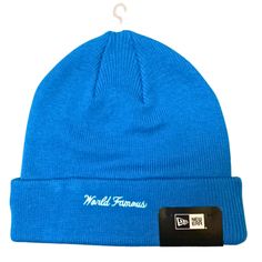 Elevate your streetwear game with our blue World Famous New Era Supreme beanie. Crafted from premium materials, this iconic beanie boasts a vibrant blue hue, featuring the renowned "World Famous" logo in striking contrast. It offers both style and comfort, making it a must-have accessory for any fashion-forward enthusiast. Stay cozy and on-trend with this limited-edition Supreme beanie. Fabric: 100% cotton One size fit all. Blue Casual Beanie For Streetwear, Casual Beanie With Embroidered Logo For Streetwear, Casual Streetwear Beanie With Embroidered Logo, Blue Winter Snapback Hat, Supreme Beanie, Blue World, Famous Logos, Vibrant Blue, Stay Cozy