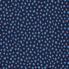 a blue and white polka dot print fabric